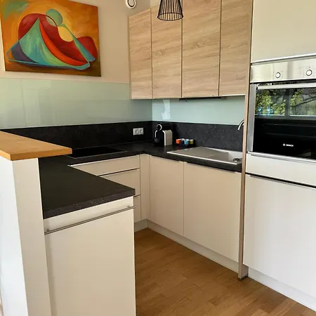 Апартаменты Reside In The Golden Wave